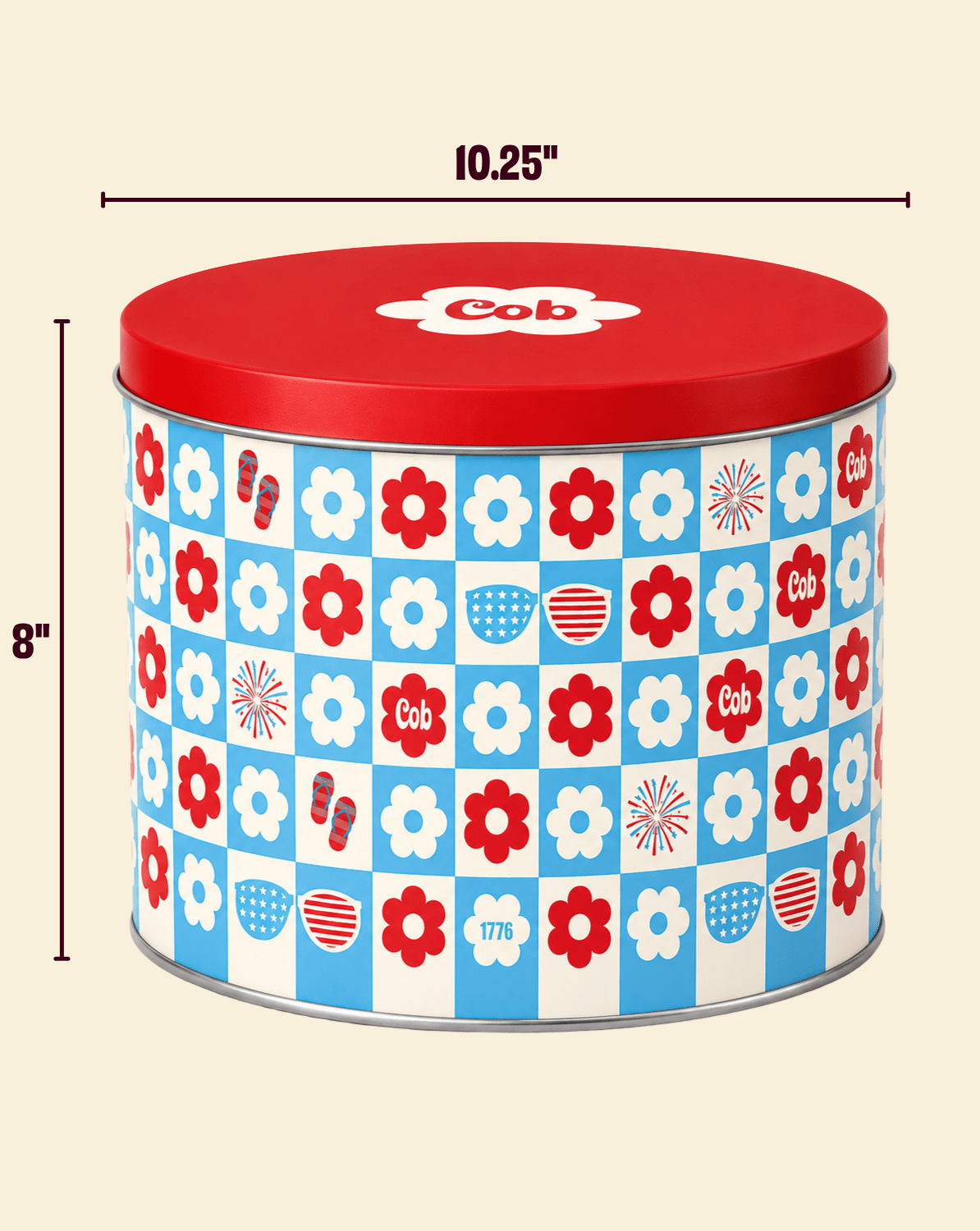 Red, white, and cob-themed gift tin from Cob featuring festive design and sturdy metal construction.