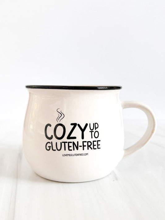 Love Me Gluten Free Cozy Mug with a warm, inviting design, perfect for enjoying hot beverages in comfort.
