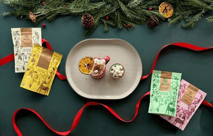 Elements Truffles Jupiter vegan hot chocolate gift box with assorted chocolates, stylish packaging, perfect for gifting.