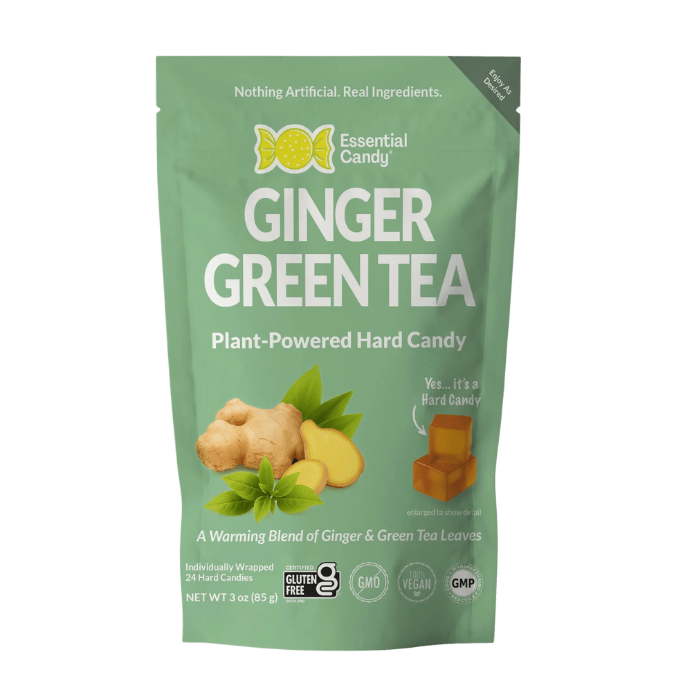 Hard candy lozenge with ginger and green tea botanical flavors from Essential Candy, shown in a clear wrapper.