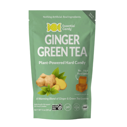 Hard candy lozenge with ginger and green tea botanical flavors from Essential Candy, shown in a clear wrapper.