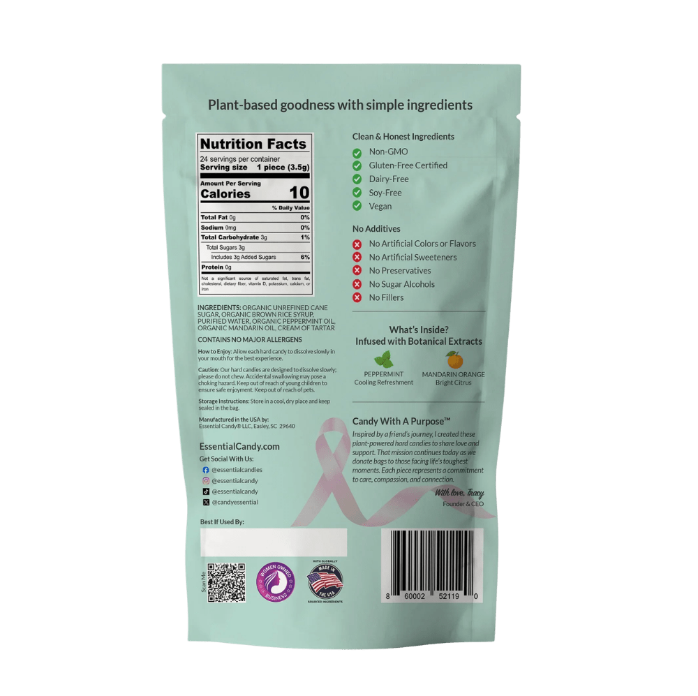 Essential Candy Peppermint Mandarin botanical hard candies in clear packaging, showcasing vibrant orange and mint flavors.