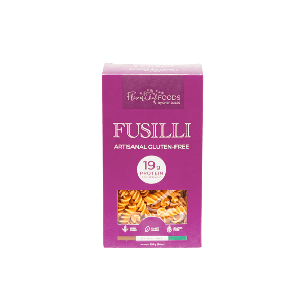 High protein Flower Chef Foods Fusilli pasta in a clear bowl, showcasing the spiral shape and vibrant color.
