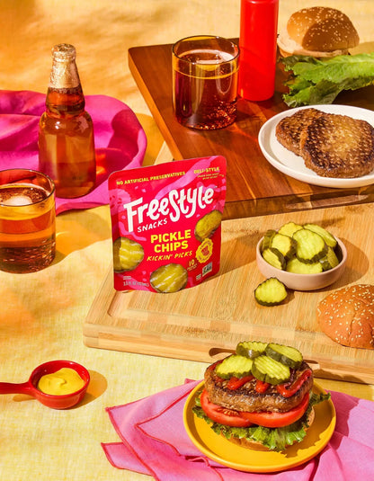 FreeStyle Snacks Kickin' Picks Pickle Chips in a bowl, showcasing crispy, seasoned pickle slices for snacking.