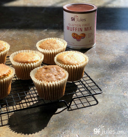 gfJules gluten-free muffin mix box, featuring the award-winning product with a colorful label and fresh muffins on display