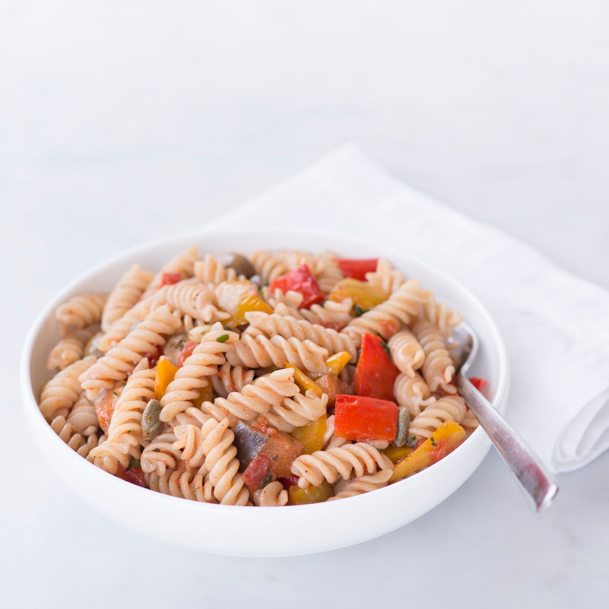 Jovial Gluten-Free Brown Rice Fusilli pasta in a family size package, showcasing the corkscrew-shaped gluten-free pasta on a white background.