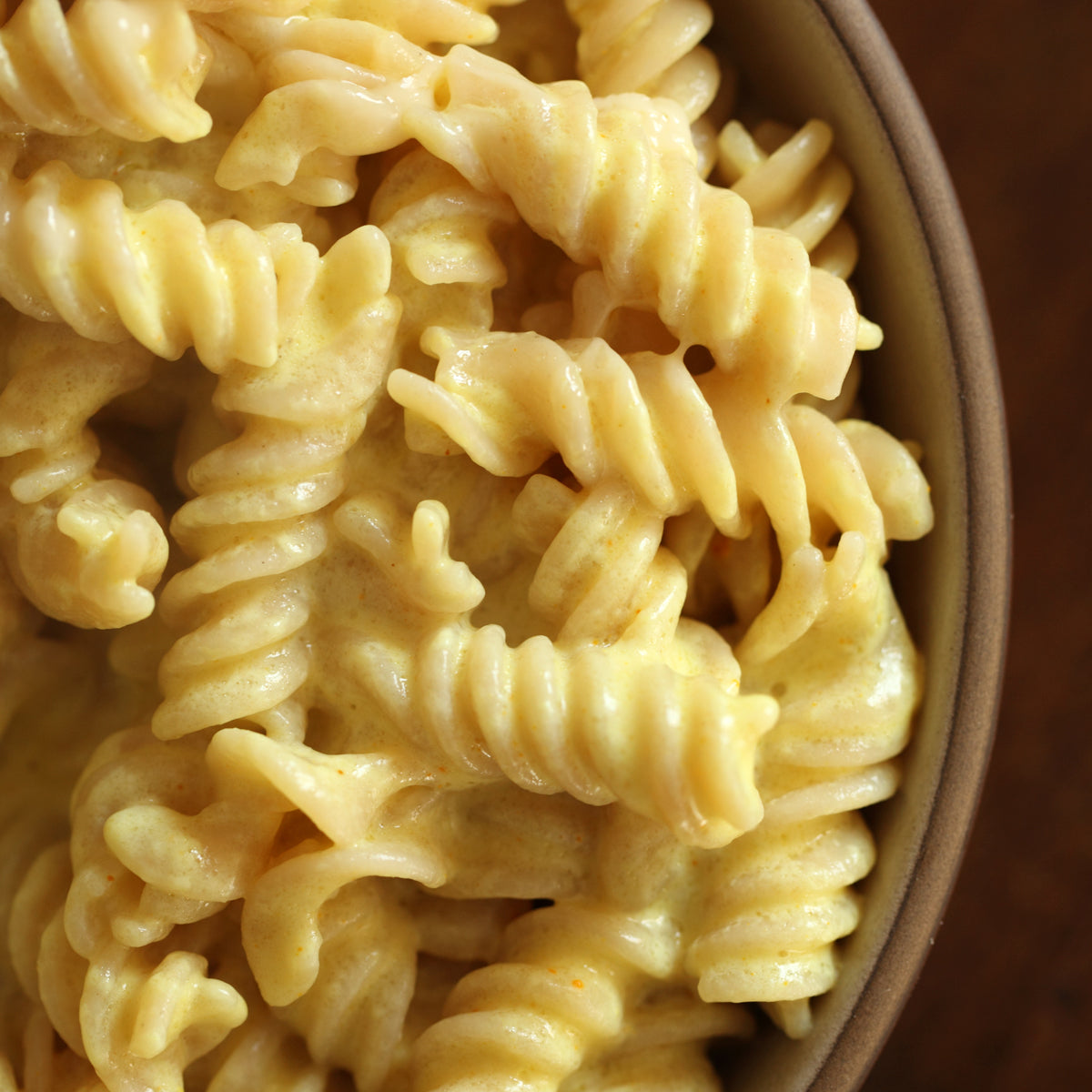 Jovial gluten-free brown rice fusilli pasta in family size package, ideal for gluten-free macaroni and cheese dishes.