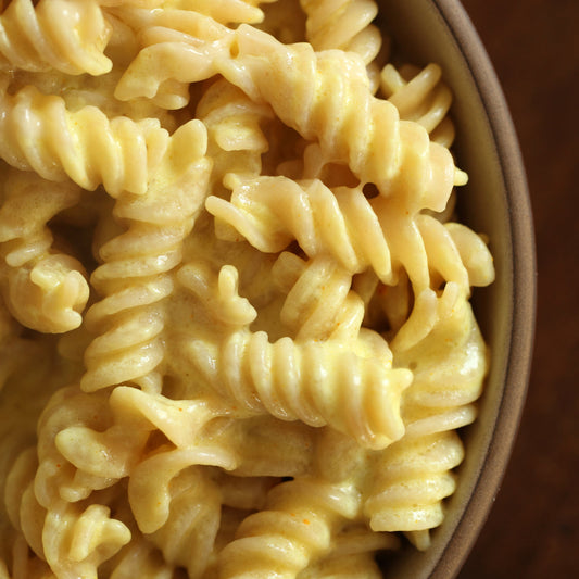 Jovial gluten-free brown rice fusilli pasta in family size package, ideal for gluten-free macaroni and cheese dishes.