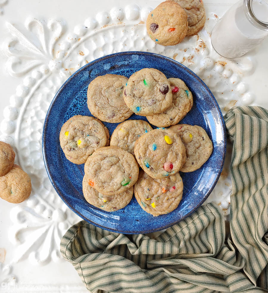 gfJules gluten-free cookie mix with freshly baked cookies on a towel, ready to enjoy homemade gluten-free treats.