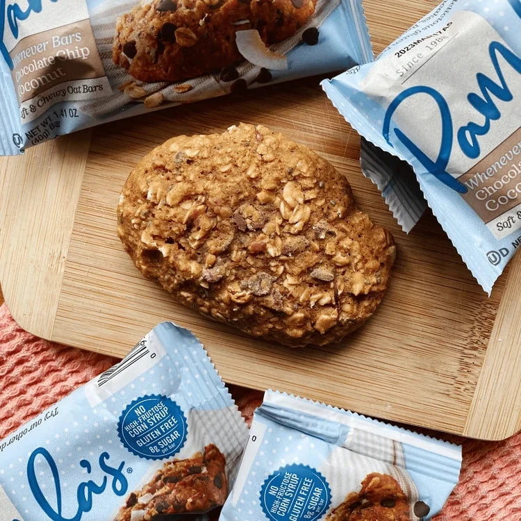 Gluten-free Pamela's Whenever Bars Variety Bundle with chocolate chip and coconut flavors on a natural lifestyle background.