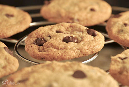 Gluten-free chocolate chip cookies made with gfJules gluten free cookie mix, fresh baked and golden brown with chocolate chips.