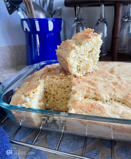Golden gluten-free cornbread baked in a 9x13-inch dish, made with gfJules Cornbread Mix, showing a freshly baked, crusty top.