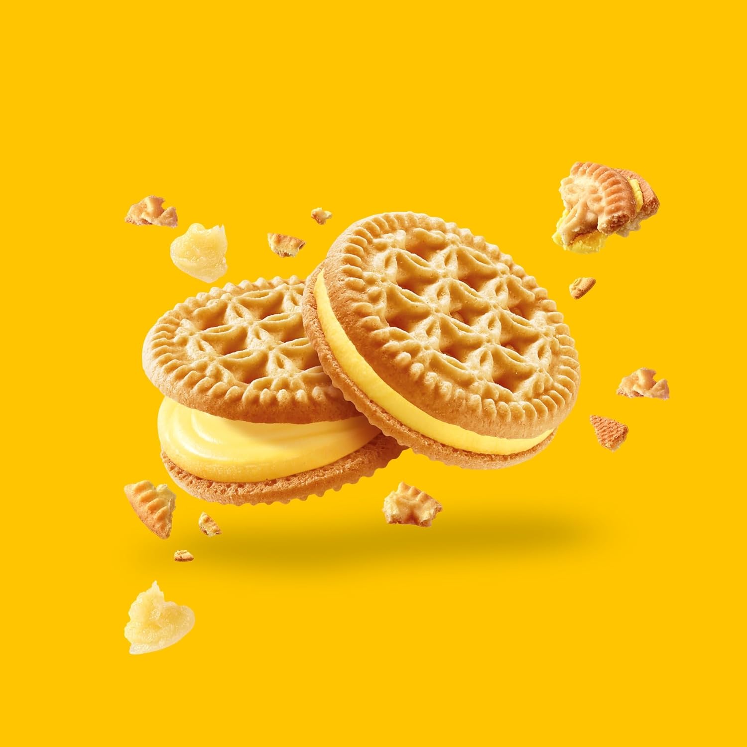 Glutino Lemon Pie Cookies with lemon filling and cookie crust, showcasing a golden, citrus-flavored snack on a white plate.