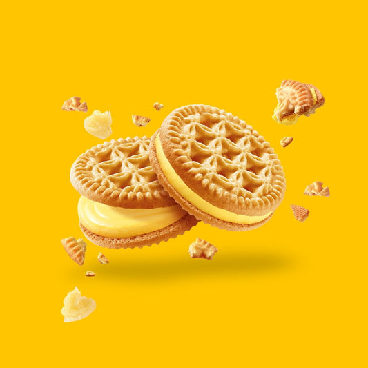 Glutino Lemon Pie Cookies with lemon filling and cookie crust, showcasing a golden, citrus-flavored snack on a white plate.