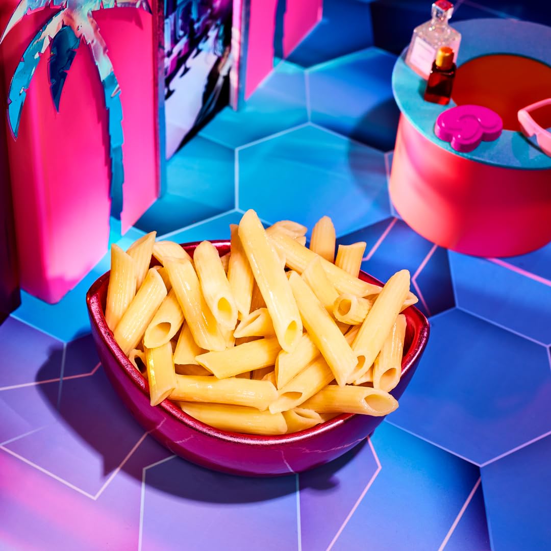 Cooked Goodles Penne noodles in a bowl, showcasing the colorful, pasta shape with a focus on the branded packaging.