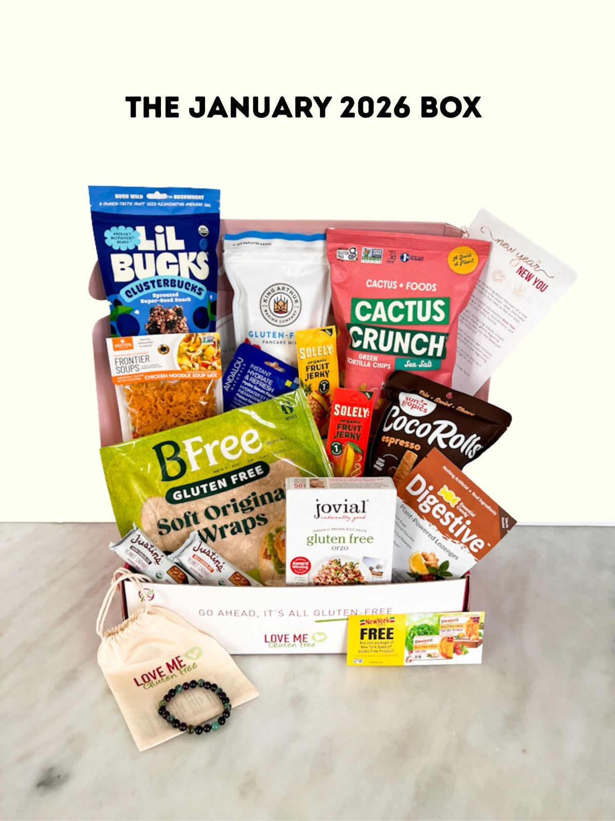 January 2026 Love Me Gluten Free box featuring assorted gluten-free snacks and treats in a colorful, branded packaging.