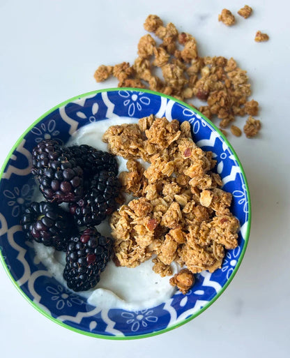 Jessica's Cinnamon Almond Granola in a bowl, showing crunchy oats, almonds, and cinnamon spices from Jessica's Natural Foods.