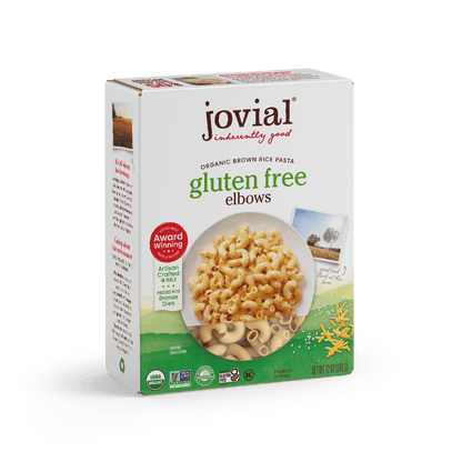 Jovial Gluten-Free Brown Rice Elbows pasta in a bowl, showcasing the rustic brown rice pasta shape and texture.