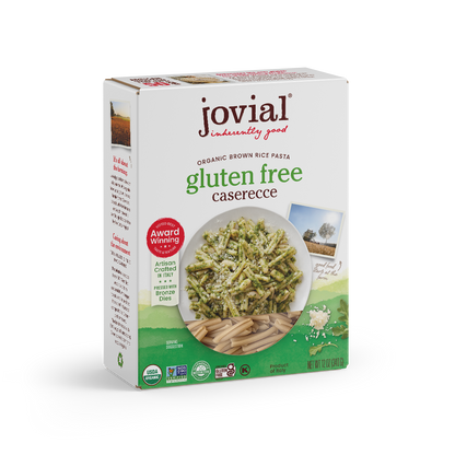 Jovial Gluten Free Brown Rice Caserecce pasta in a clear container, showcasing short, twisted pasta shapes made from brown rice