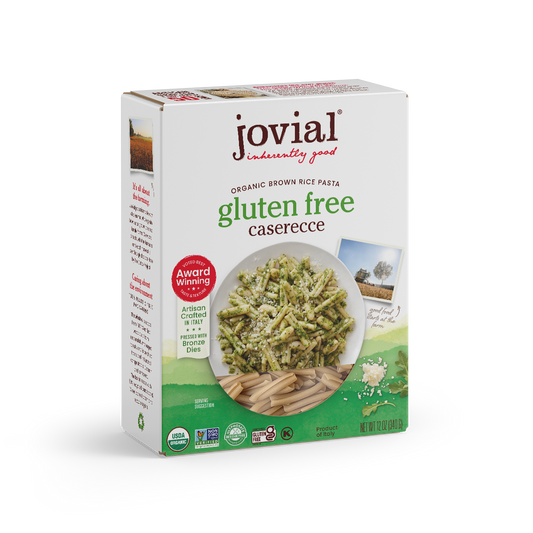 Jovial Gluten Free Brown Rice Caserecce pasta in a clear container, showcasing short, twisted pasta shapes made from brown rice