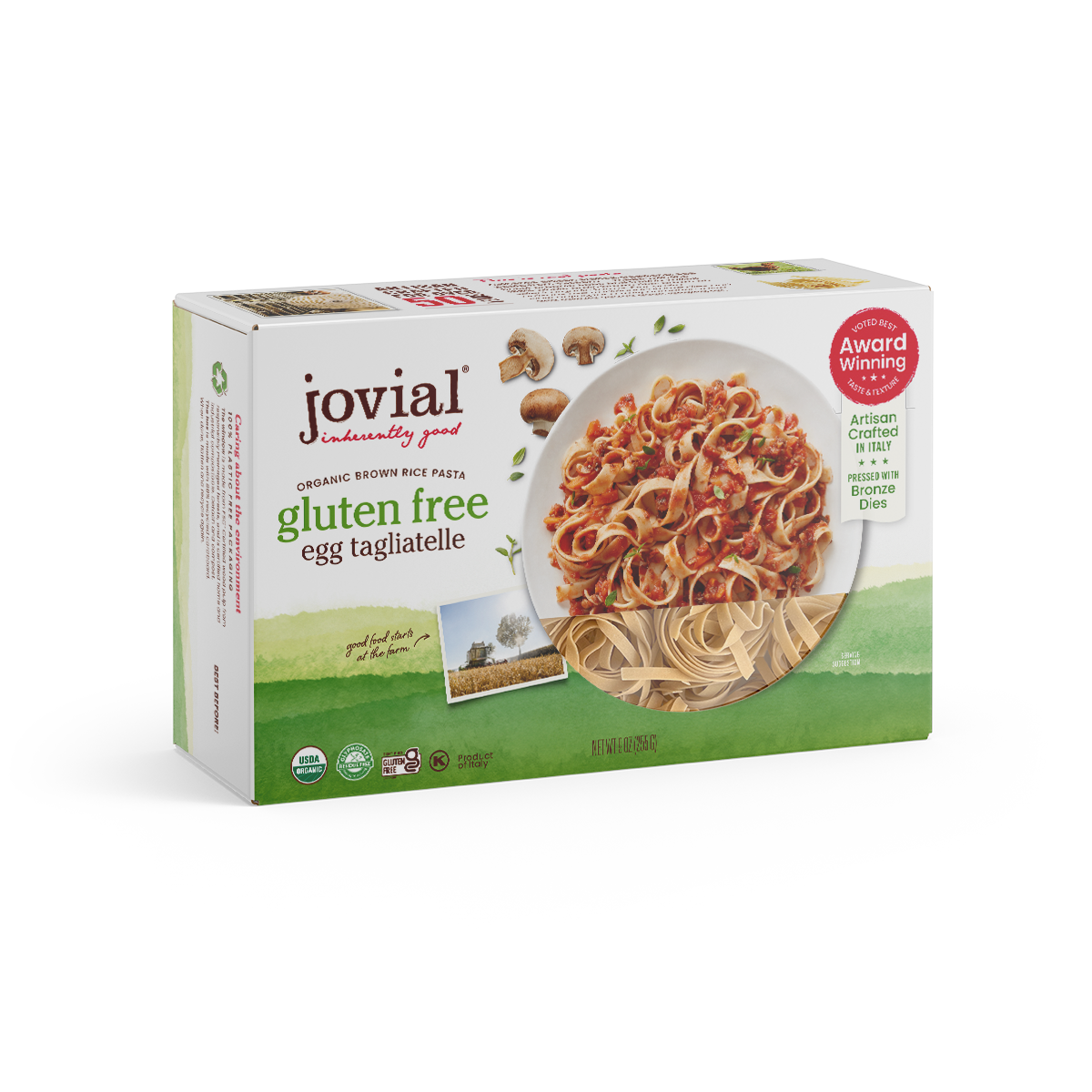 Jovial Gluten Free Brown Rice Pasta Egg Tagliatelle, uncooked, in a package showing the pasta strands and branding.