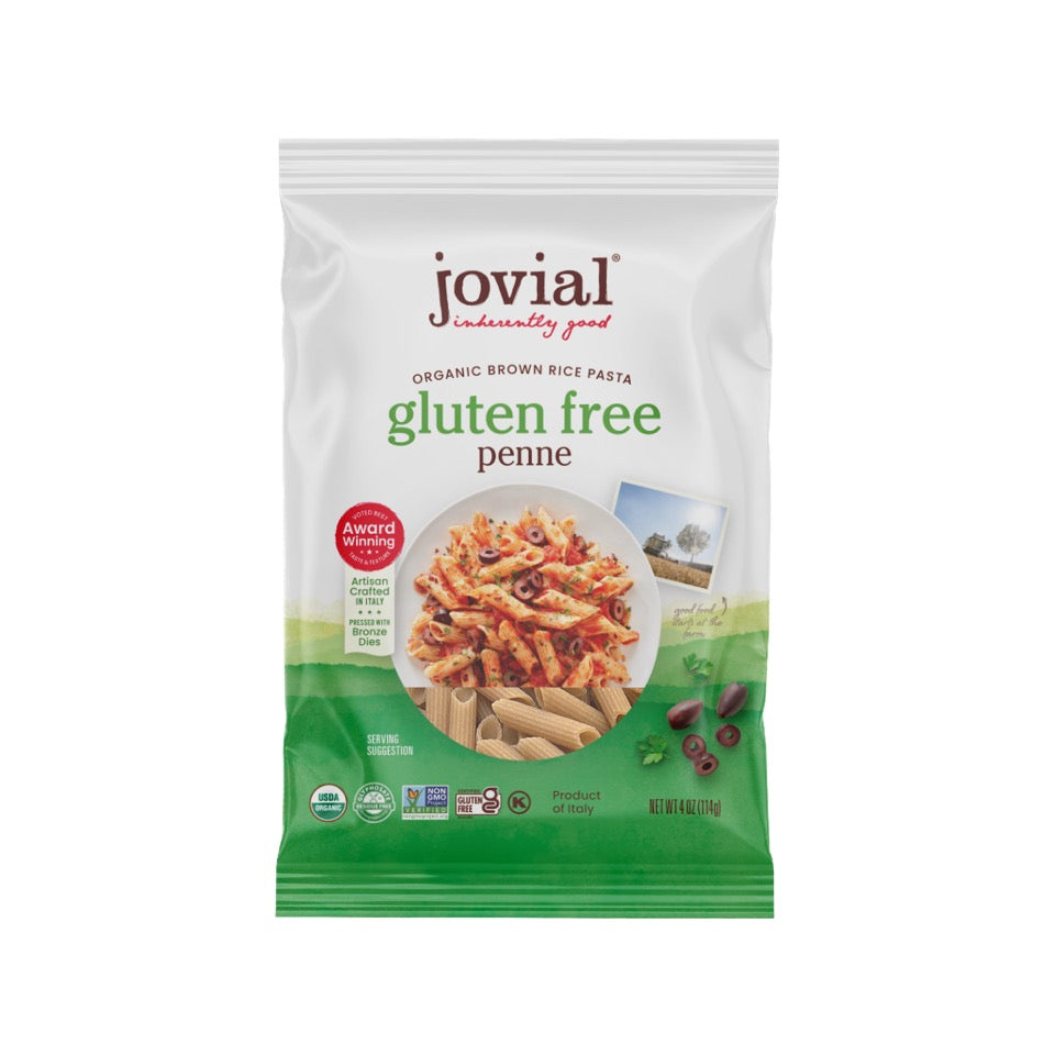 Single serving of Jovial Gluten-Free Brown Rice Penne pasta in a clear container, showing the short, tubular pasta shape.