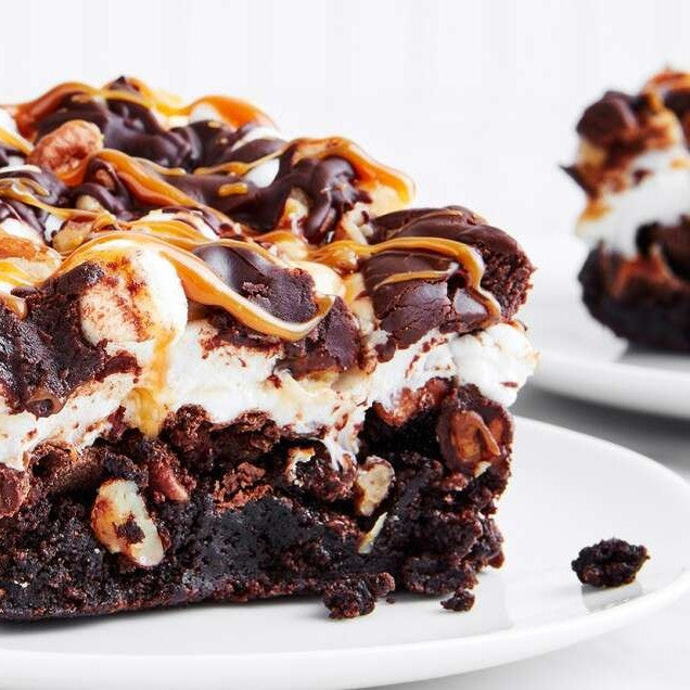 King Arthur gluten-free rocky road brownies showing chocolate, marshmallows, and nuts in a close-up of the baked treat.