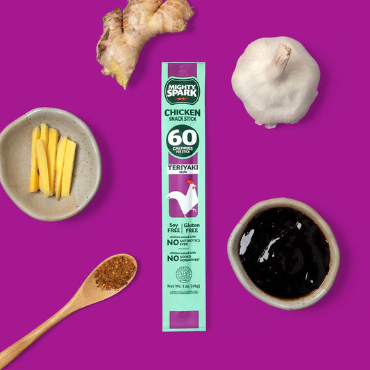 Mighty Spark Chicken Snack Sticks in Teriyaki flavor, 12-pack, showing grilled chicken snack sticks with teriyaki glaze.