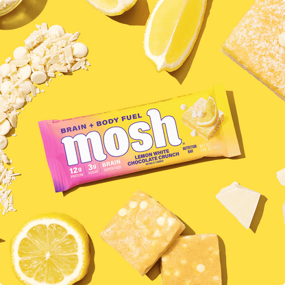 MOSH Lemon White Chocolate Crunch protein bar showing lemon-flavored white chocolate coating and crunchy texture.