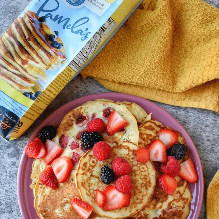 Pamela's Products baking essentials bundle with a 4lb bag of pancake baking mix, showcasing the packaging and product details.