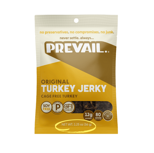 Eight individual packs of PREVAIL Jerky Original Turkey Jerky, single serve snack packs displayed in a row.
