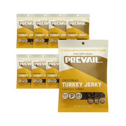 Eight single-serve packs of PREVAIL Jerky Original Turkey Jerky arranged in a display.