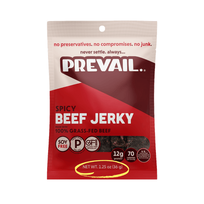 Spicy beef jerky from PREVAIL Jerky, single-serve pack of 8, with seasoned, savory strips in a resealable package.
