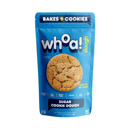 Whoa Dough Ready to Bake Sugar Cookie Dough in a plastic container, showing prepared cookie dough for baking.