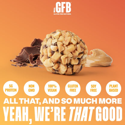 The GFB Dark Chocolate Peanut Butter Bites in a clear container, showing bite-sized peanut butter and dark chocolate snack pieces.