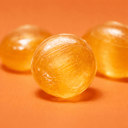 Tummydrops Mandarin Matcha Collection featuring colorful citrus and matcha flavored lozenges in a decorative box.