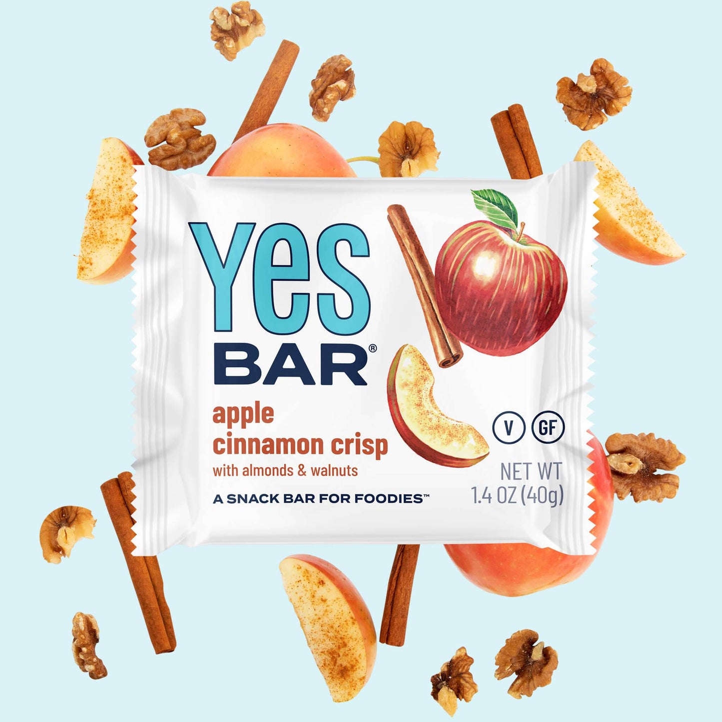 Six YES BAR Apple Cinnamon Crisp energy bars with clean edges, showing their apple cinnamon flavor and packaging design.
