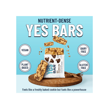 Six-pack of YES BAR Dark Chocolate Chip energy bars with visible dark chocolate chips and packaging label.
